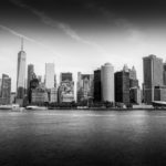 Staten Island Ferry offers views of the Statue of Liberty and Manhattan Skyline Manhattan Skyline Black and White Photograph by Tim Jackson