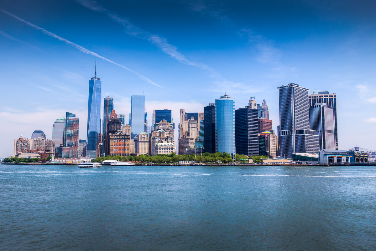 Staten Island Ferry offers views of the Statue of Liberty and Manhattan Skyline Manhattan Skyline Photograph by Tim Jackson