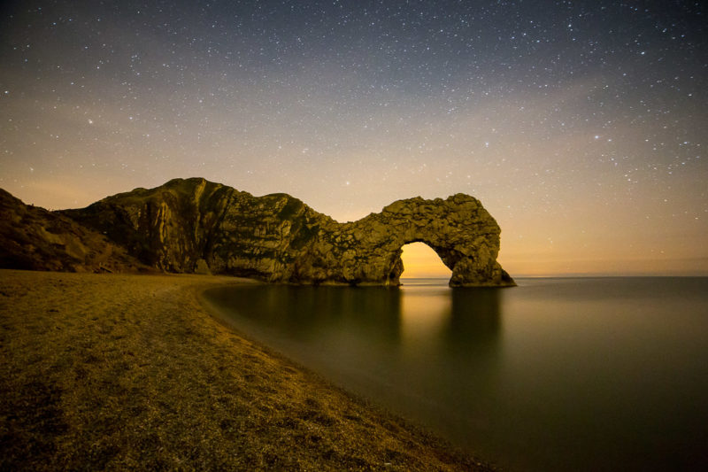 Durdle Door at Night Durdle Door at Night Photograph by Tim Jackson