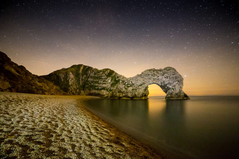 Stargazing Light Painting Durdle Door Photograph by Tim Jackson