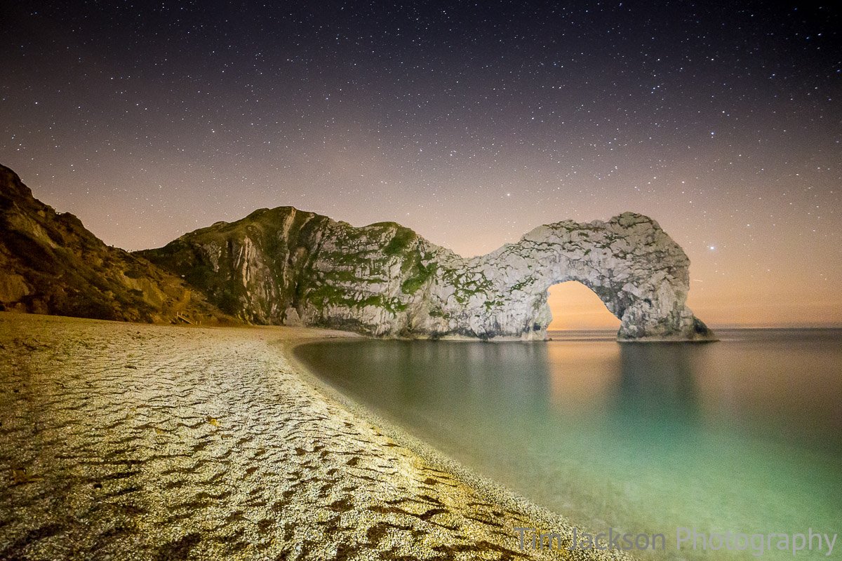 Night photography at Durdle Door Light Patining at Durdle Door 2 Photograph by Tim Jackson