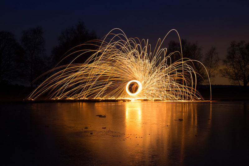 Steel Wool Spinning Steel Wool Spinning by Frozen Pond Photograph by Tim Jackson