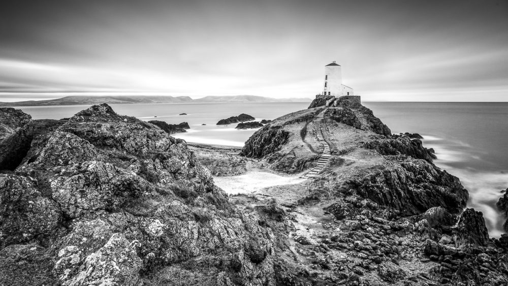 Do photographers miss out on enjoying the moment they are trying to capture? Llanddwyn Island Photograph by Tim Jackson